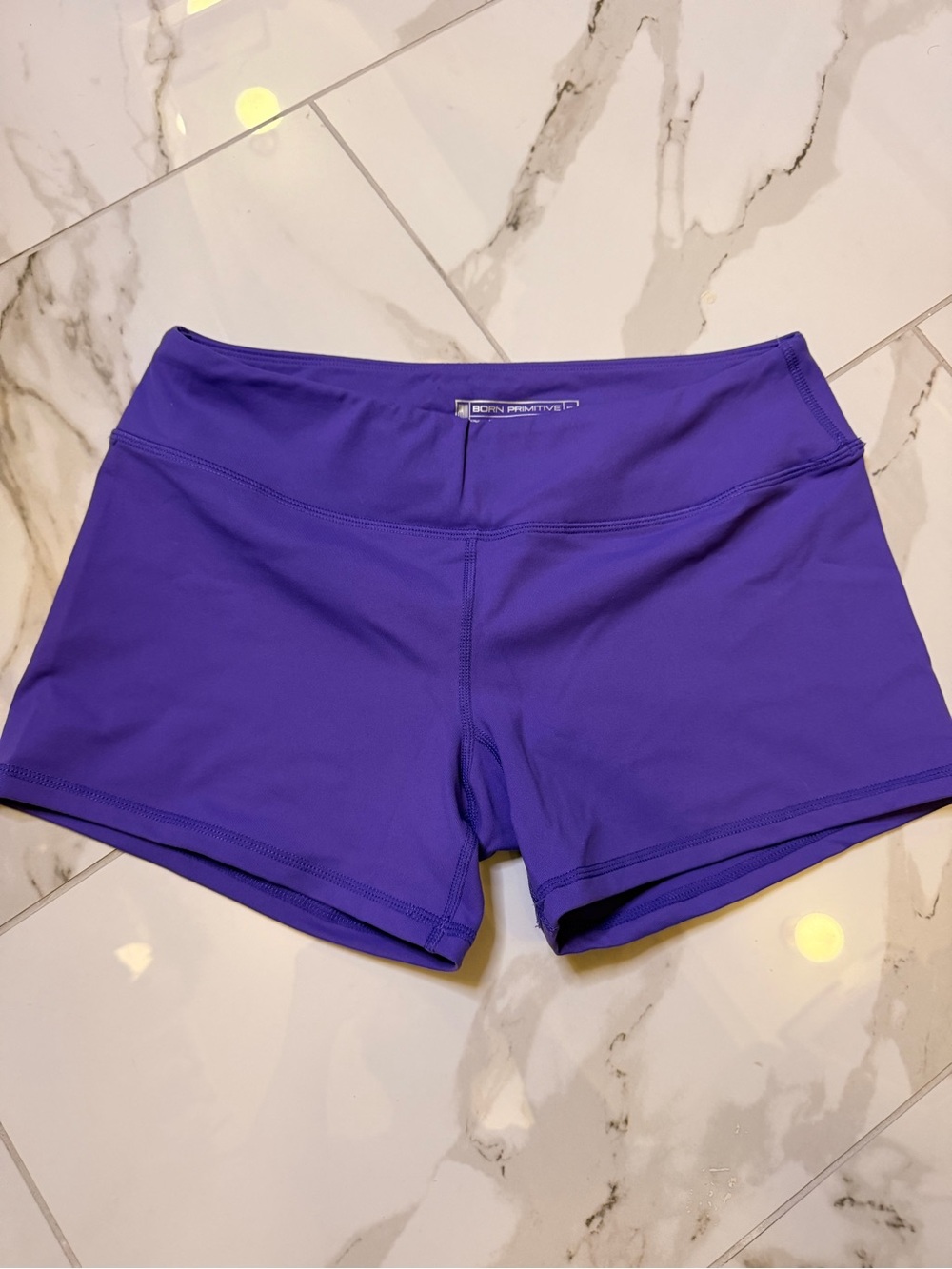 Born Primitive Women's Violet Performance Athletic Shorts